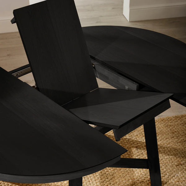 BLACK DINING TABLE - EXTENDING IN ROOM SHOT