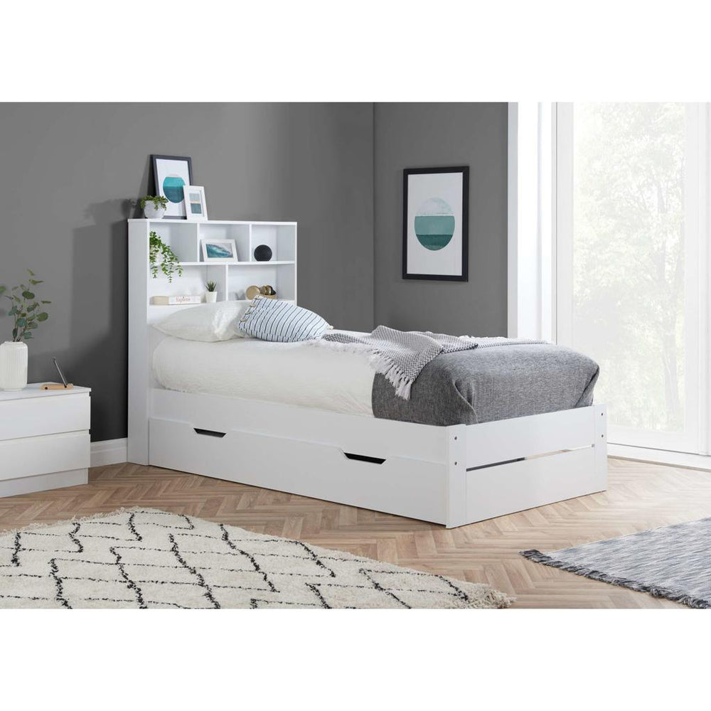 White bed frame with storage drawers on a white background