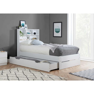 White bed with storage drawers in a bedroom setting