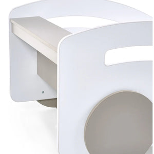 White children's bed with a small desk attached to one side on a white background