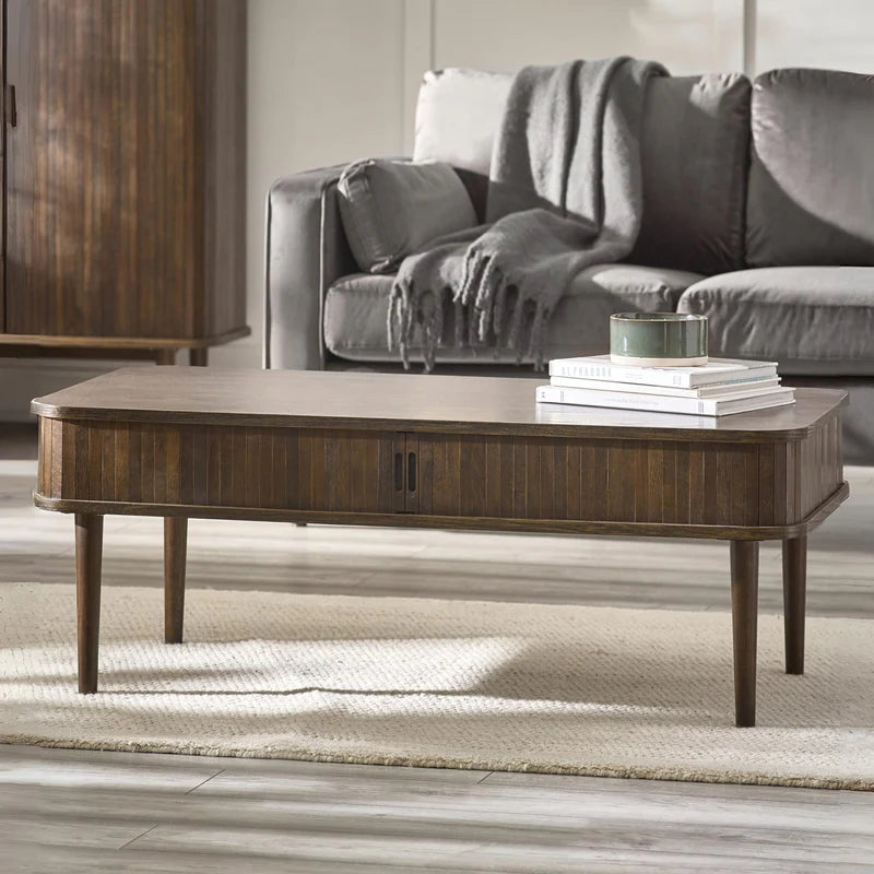 Wooden coffee table with a white marble top on a white background