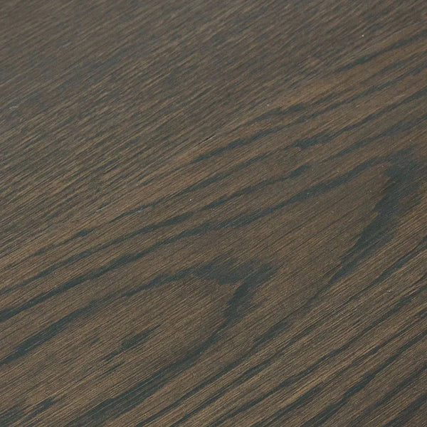 Close-up of a dark brown wood texture
