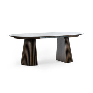 Dining table with unique cylindrical legs on a white background