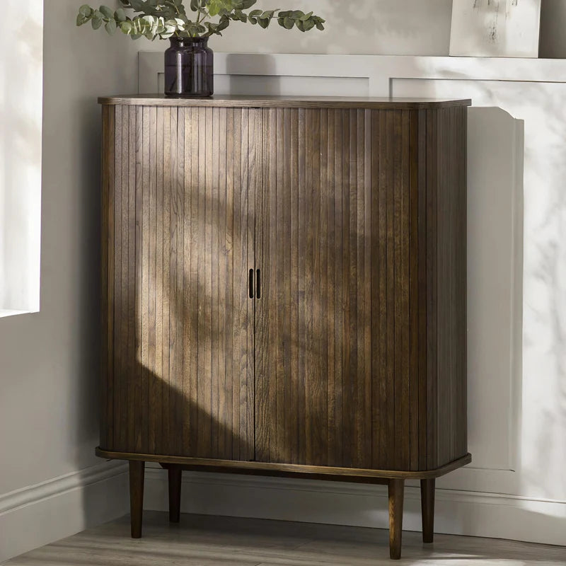 Wooden cabinet with a dark finish on a white background