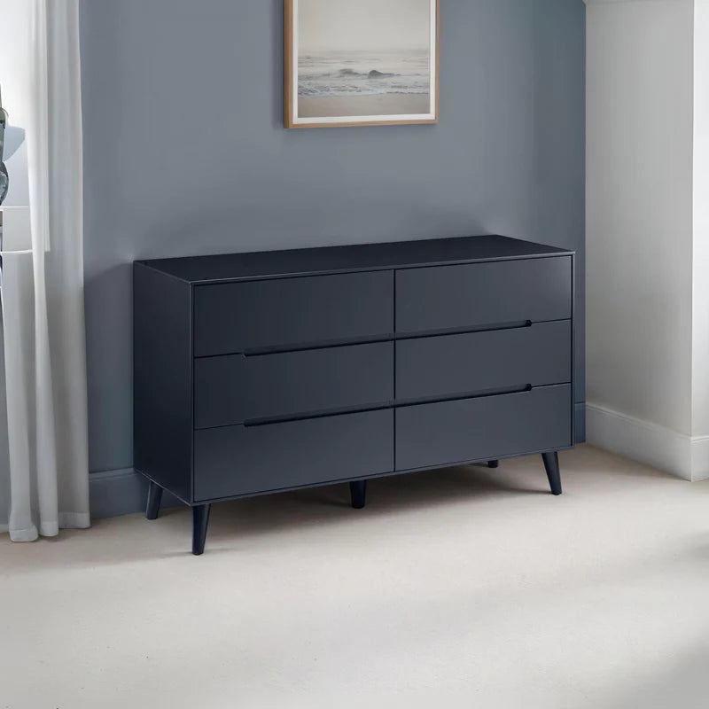 Black dresser with six drawers on a white background