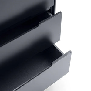 Close-up of a metallic drawer with a grid pattern on a white background
