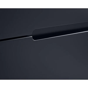 Close-up of a black electronic device with a metallic accent on a white background