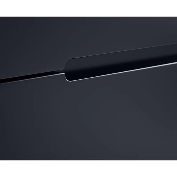 Close-up of a black electronic device with a metallic accent on a white background
