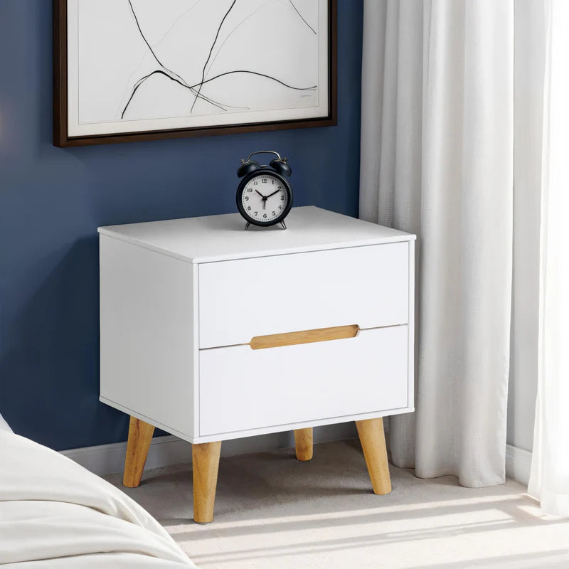 White nightstand with wooden legs and handle on a white background