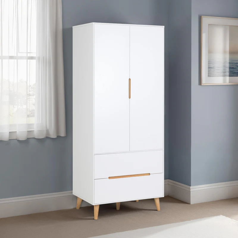 White wardrobe with wooden accents on a white background