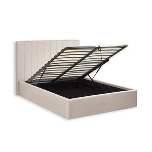 Beige bed frame with black metal slat support on a white background