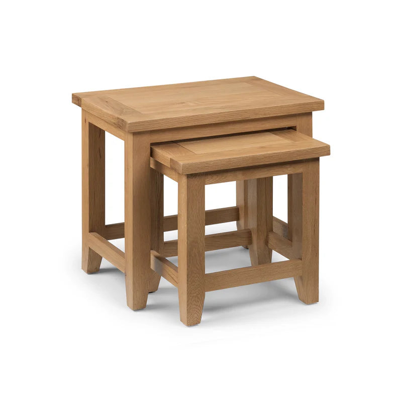 Set of two wooden nesting tables on a white background