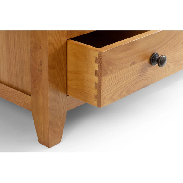 Wooden drawer with a knob on a white background