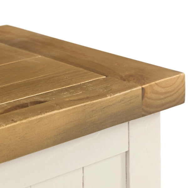 Wooden countertop on a white cabinet