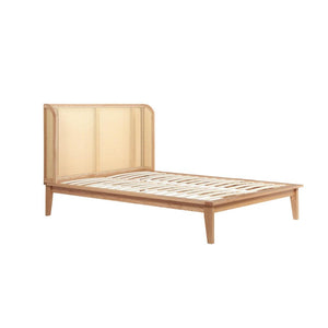 Wooden bed frame with woven headboard on a white background