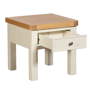 Small wooden side table with a drawer on a white background
