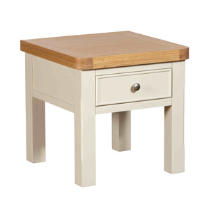 Wooden side table with a drawer on a white background