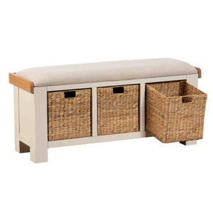 White bench with wicker storage baskets on a white background