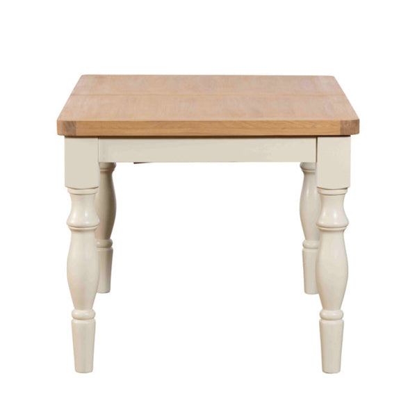 Small wooden table with white base on a white background