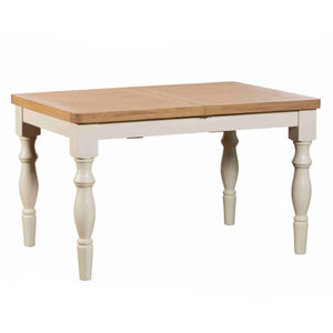 Wooden dining table with white base on a white background