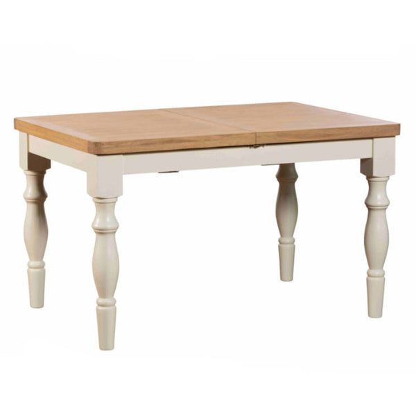 Wooden dining table with white base on a white background