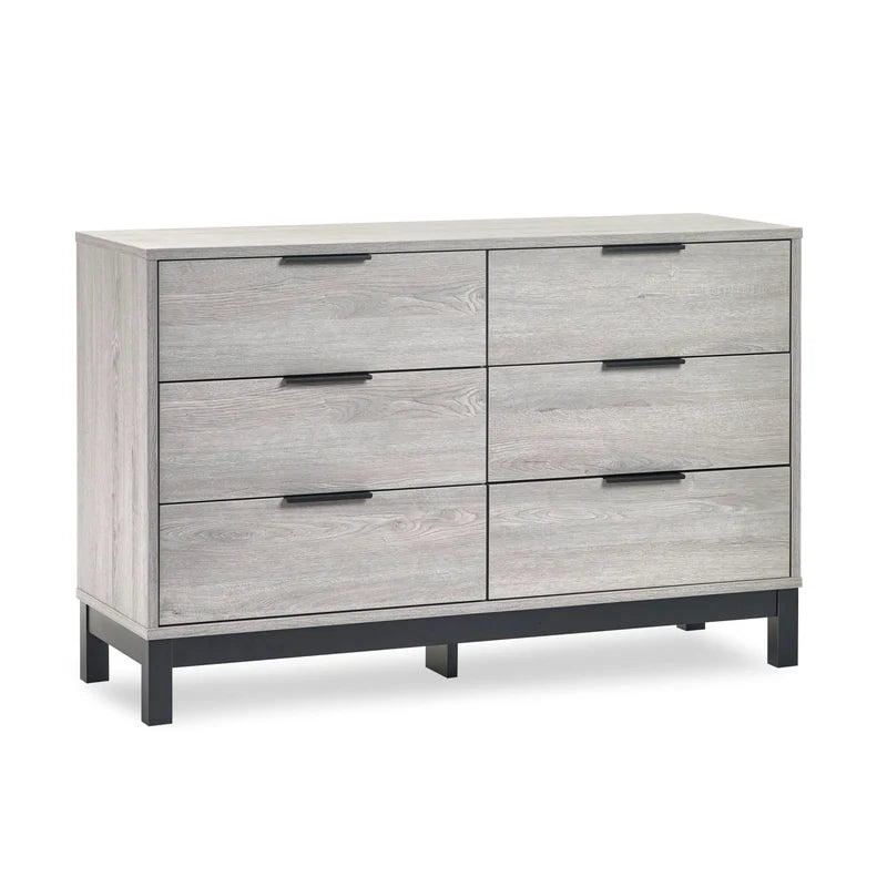 Gray dresser with six drawers on a white background