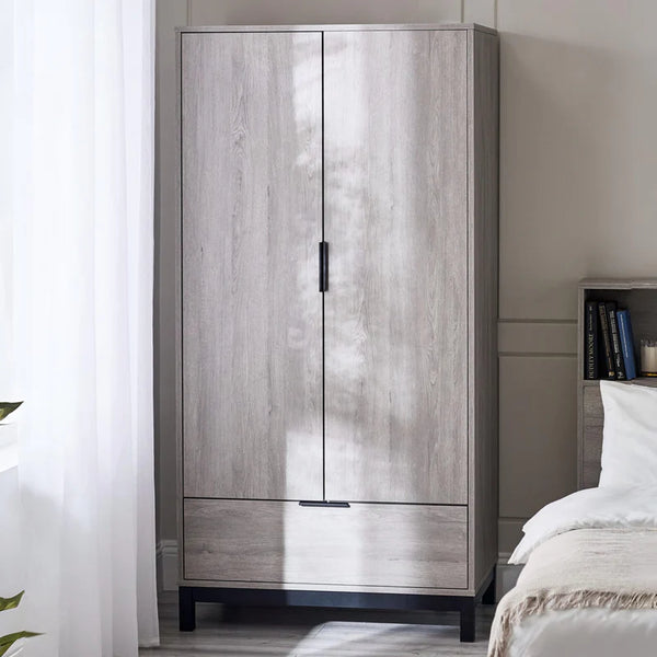Wooden wardrobe with a bed in a bedroom setting