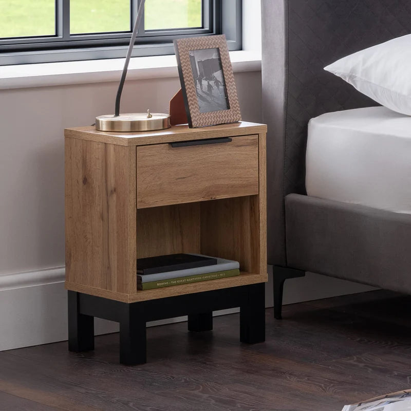 Wooden nightstand with a drawer on a white background