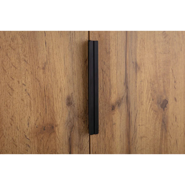 Black handle on a wooden cabinet door