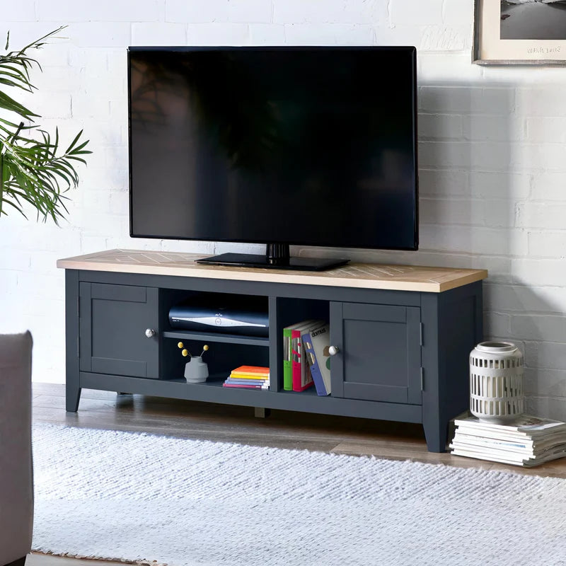 Grey TV stand with a wooden top on a white background