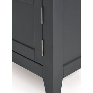 Dark gray cabinet with a visible hinge on a white background