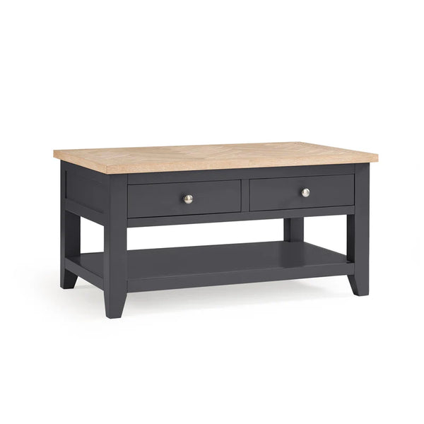 Wooden coffee table with dark gray base on a white background