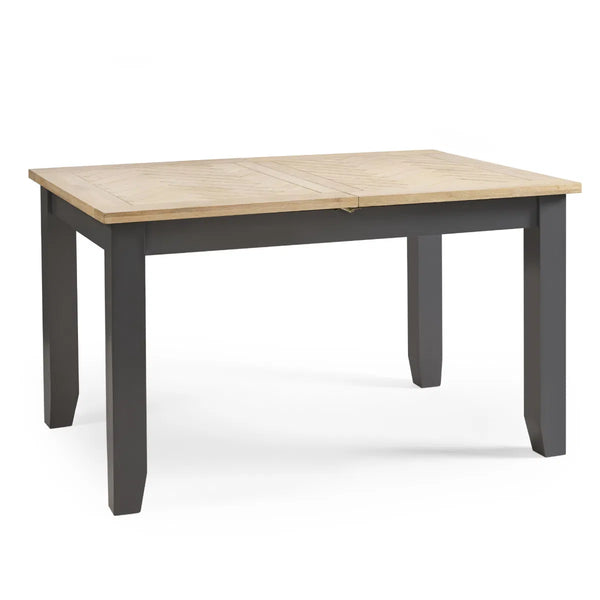 Rectangular table with wooden top and dark gray base on a white background