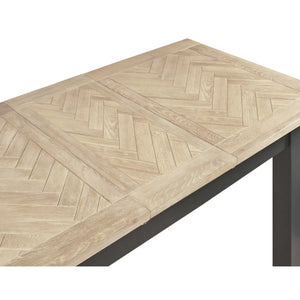 Wooden table with herringbone pattern on a white background
