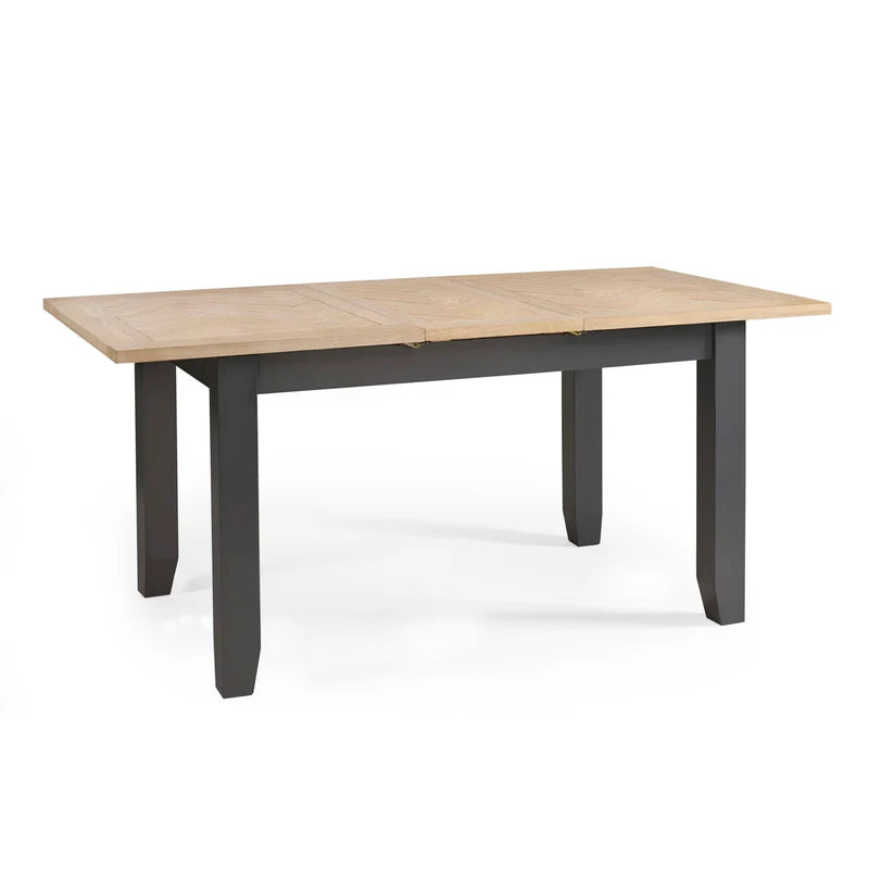 Rectangular table with wooden top and grey legs on a white background