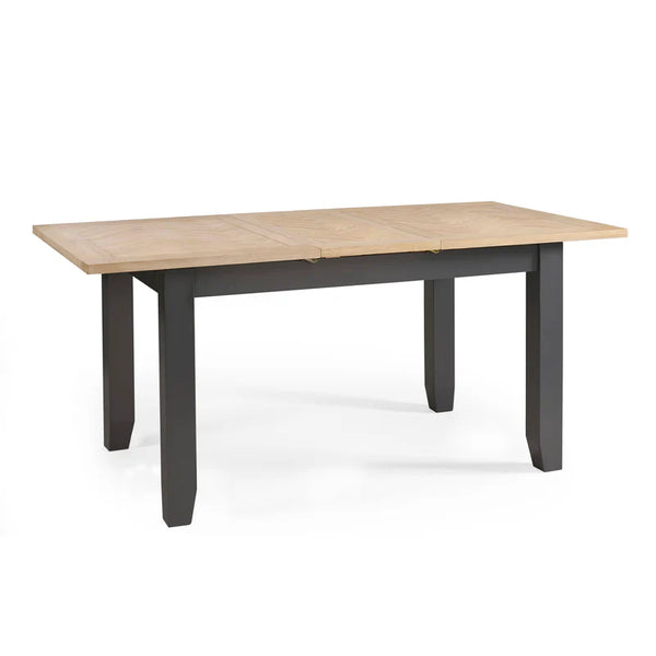Rectangular table with wooden top and grey legs on a white background