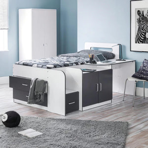 Modern bedroom with a bed, desk, and wardrobe.