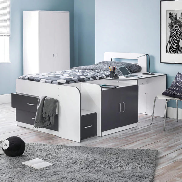 Modern bedroom with a bed, desk, and wardrobe.