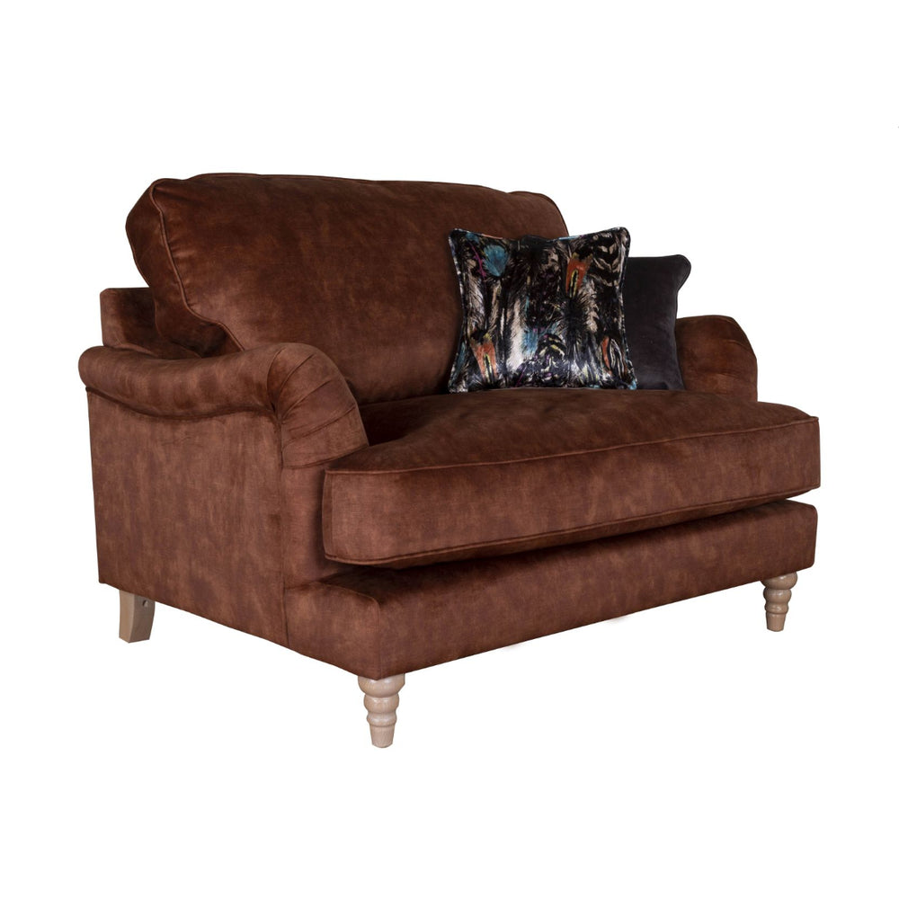 Brown sofa with decorative pillows on a white background