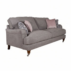Gray sofa with decorative pillows on a white background