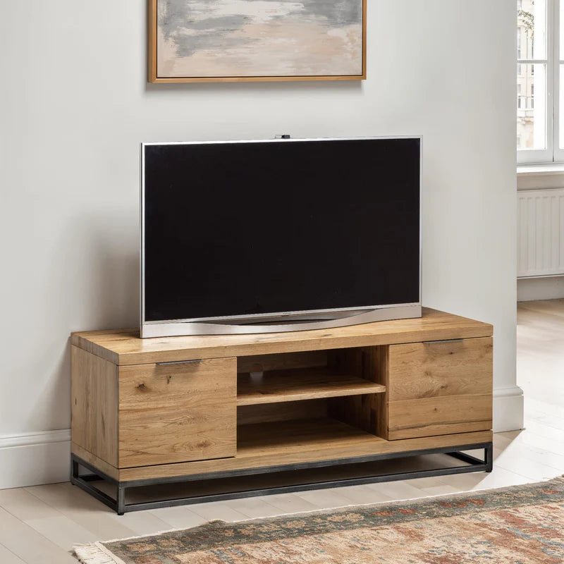 Wooden TV stand with metal legs on a white background