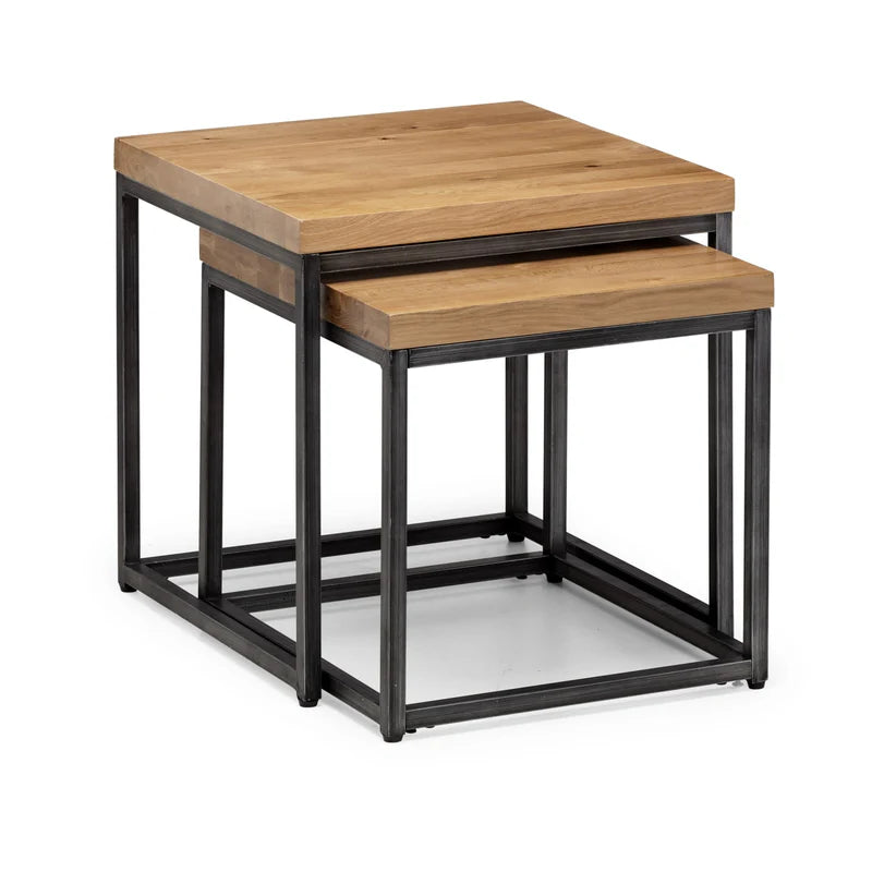 Set of two wooden nesting tables with black metal frames on a white background