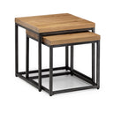 Set of two wooden nesting tables with black metal frames on a white background