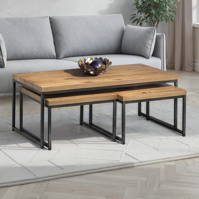 Set of two wooden tables with metal legs on a white background