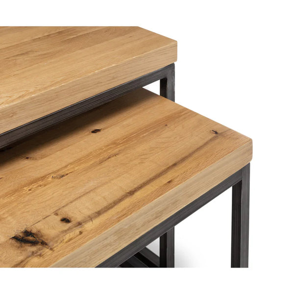 Two wooden tables with metal legs on a white background