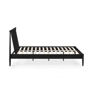 Black metal bed frame on a white background