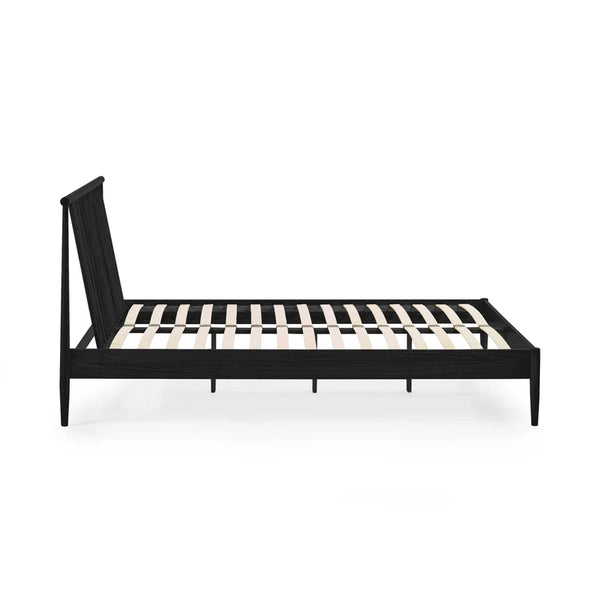 Black metal bed frame on a white background