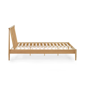 Wooden bed frame on a white background