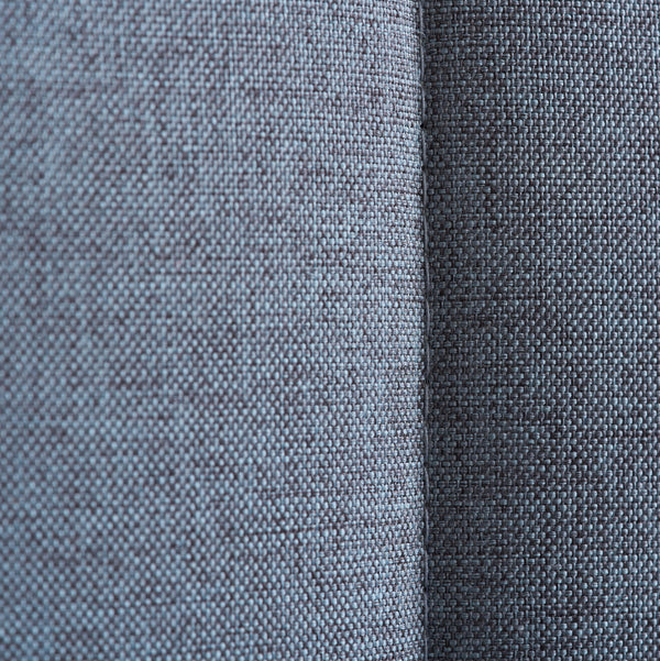 Close-up of two different textures of gray fabric