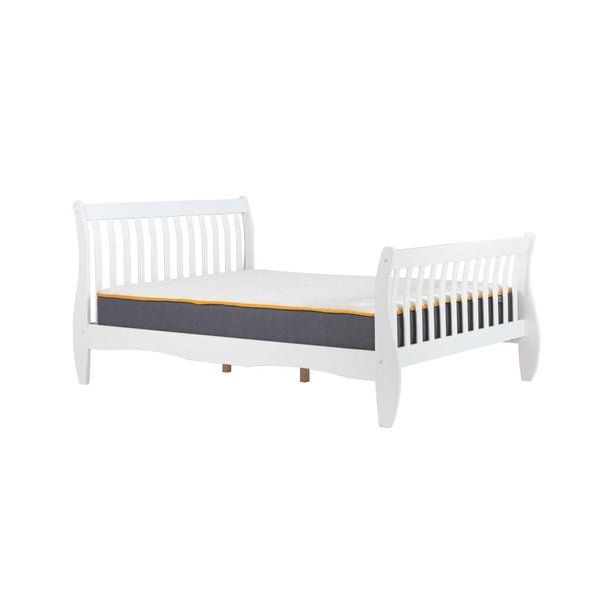White bed frame with mattress on white background